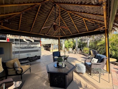 STUNNING LAKE VIEW! Get ready to fall in love with this on St. Lucie Trail Golf Club in Florida - for sale on GolfHomes.com, golf home, golf lot