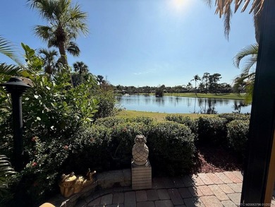 STUNNING LAKE VIEW! Get ready to fall in love with this on St. Lucie Trail Golf Club in Florida - for sale on GolfHomes.com, golf home, golf lot