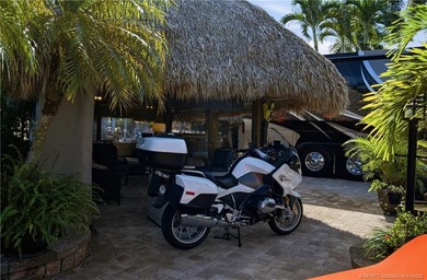 Located on one of the resort's most sought-after streets with an on St. Lucie Trail Golf Club in Florida - for sale on GolfHomes.com, golf home, golf lot