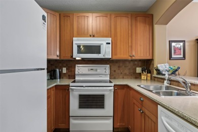 Ski-in/ski-out mountain retreat backing onto the 17th tee of Sun on  in  - for sale on GolfHomes.com, golf home, golf lot