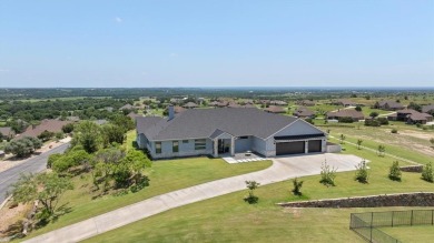 Modern Luxury-Hilltop Views! Nestled atop a hill, commanding on Canyon West Golf Club in Texas - for sale on GolfHomes.com, golf home, golf lot
