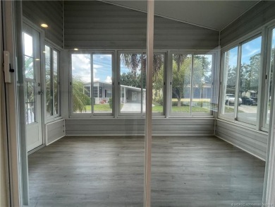 NO POPCORN CEILINGS HERE! This pristine clean unfurnished home on Indianwood Golf and Country Club in Florida - for sale on GolfHomes.com, golf home, golf lot