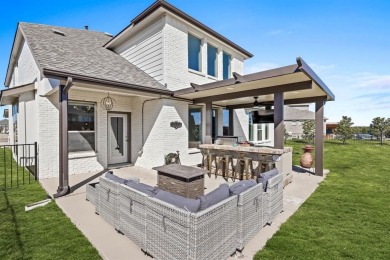 Discover luxury living in this stunning 4-bedroom, 3-bath home on Heath Golf and Yacht Club in Texas - for sale on GolfHomes.com, golf home, golf lot