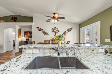 Welcome to this beautifully maintained 1,814 sqft single-story on Desert Lakes Golf Course in Arizona - for sale on GolfHomes.com, golf home, golf lot