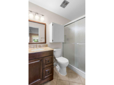 This partially FURNISHED 2-bed, 2-bath condo in the active and on Falcon Watch Golf Club in Florida - for sale on GolfHomes.com, golf home, golf lot