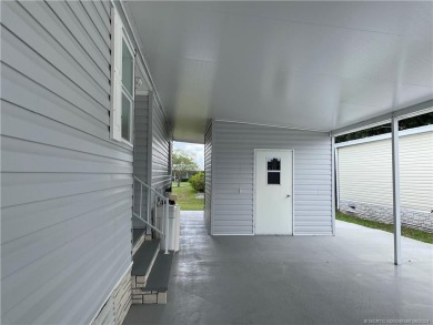 NO POPCORN CEILINGS HERE! This pristine clean unfurnished home on Indianwood Golf and Country Club in Florida - for sale on GolfHomes.com, golf home, golf lot