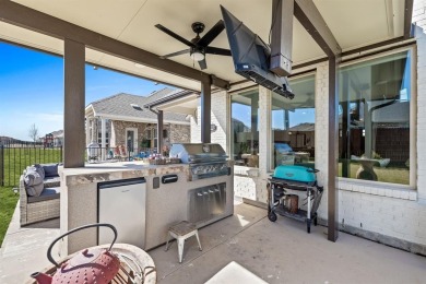 Discover luxury living in this stunning 4-bedroom, 3-bath home on Heath Golf and Yacht Club in Texas - for sale on GolfHomes.com, golf home, golf lot