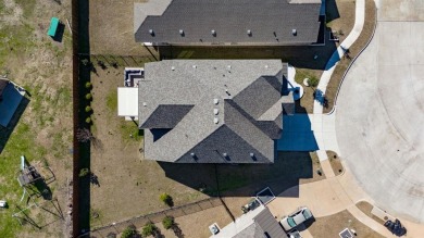 Discover luxury living in this stunning 4-bedroom, 3-bath home on Heath Golf and Yacht Club in Texas - for sale on GolfHomes.com, golf home, golf lot
