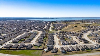 Discover luxury living in this stunning 4-bedroom, 3-bath home on Heath Golf and Yacht Club in Texas - for sale on GolfHomes.com, golf home, golf lot