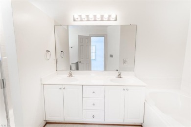 Welcome to this beautiful, all brick, end unit town home located on Cypress Point Country Club in Virginia - for sale on GolfHomes.com, golf home, golf lot
