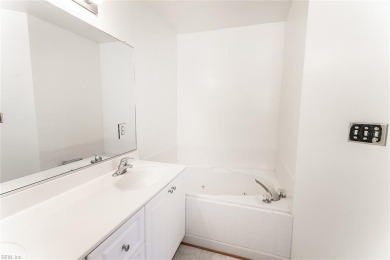 Welcome to this beautiful, all brick, end unit town home located on Cypress Point Country Club in Virginia - for sale on GolfHomes.com, golf home, golf lot