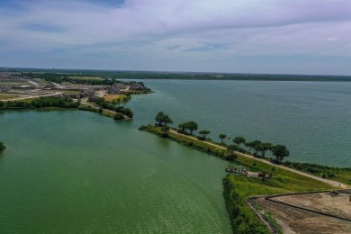 Discover luxury living in this stunning 4-bedroom, 3-bath home on Heath Golf and Yacht Club in Texas - for sale on GolfHomes.com, golf home, golf lot