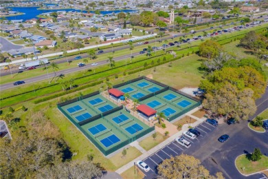 This partially FURNISHED 2-bed, 2-bath condo in the active and on Falcon Watch Golf Club in Florida - for sale on GolfHomes.com, golf home, golf lot