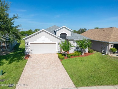 Golf lover's paradise! Nestled in a gated community along the on Viera East Golf Club in Florida - for sale on GolfHomes.com, golf home, golf lot