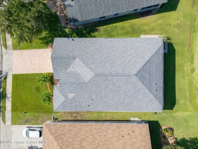 Golf lover's paradise! Nestled in a gated community along the on Viera East Golf Club in Florida - for sale on GolfHomes.com, golf home, golf lot