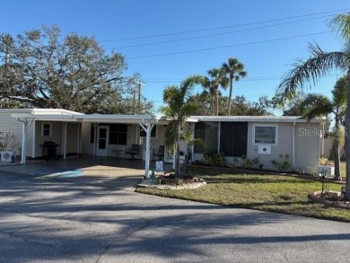 YOU'RE GONNA LOVE THIS *ADORABLE* MOBILE HOME IN PRISTINE GOLF on Heather Hills Golf Course in Florida - for sale on GolfHomes.com, golf home, golf lot