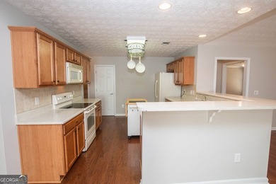 Welcome to 1029 Stone Creek Lane! This adorable 3 bedroom/2 bath on Monroe Golf and Country Club in Georgia - for sale on GolfHomes.com, golf home, golf lot