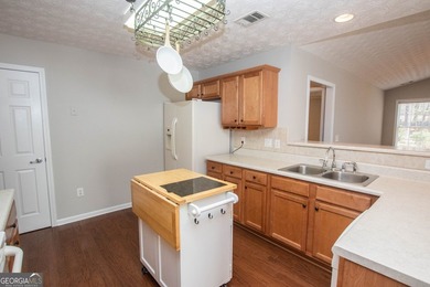 Welcome to 1029 Stone Creek Lane! This adorable 3 bedroom/2 bath on Monroe Golf and Country Club in Georgia - for sale on GolfHomes.com, golf home, golf lot