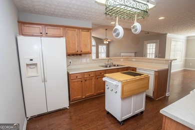 Welcome to 1029 Stone Creek Lane! This adorable 3 bedroom/2 bath on Monroe Golf and Country Club in Georgia - for sale on GolfHomes.com, golf home, golf lot