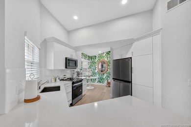 Wow what a showstopper! Shows like a model! This 3 BR 2 BA 2 car on  in Florida - for sale on GolfHomes.com, golf home, golf lot