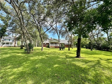 Imagine mornings on your spacious covered front porch or on Okefenokee Country Club in Georgia - for sale on GolfHomes.com, golf home, golf lot