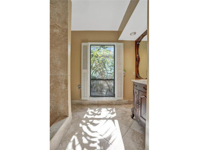 Elegant 2-bedroom, 2-bath residence with a 2-car garage, ideally on Jonathans Landing Golf Club in Florida - for sale on GolfHomes.com, golf home, golf lot