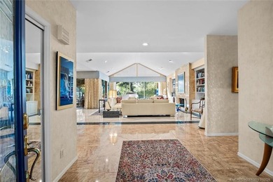 A truly exceptional offering within a secure gated enclave on Harbour Ridge Yacht and Country Club in Florida - for sale on GolfHomes.com, golf home, golf lot