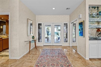 A truly exceptional offering within a secure gated enclave on Harbour Ridge Yacht and Country Club in Florida - for sale on GolfHomes.com, golf home, golf lot