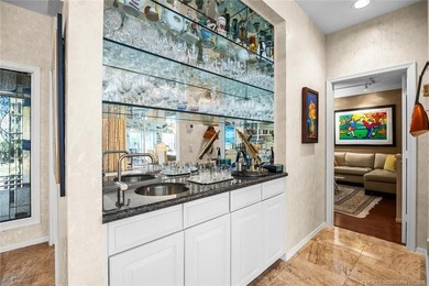 A truly exceptional offering within a secure gated enclave on Harbour Ridge Yacht and Country Club in Florida - for sale on GolfHomes.com, golf home, golf lot