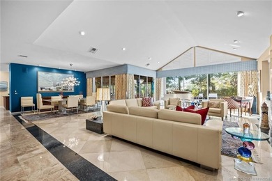 A truly exceptional offering within a secure gated enclave on Harbour Ridge Yacht and Country Club in Florida - for sale on GolfHomes.com, golf home, golf lot