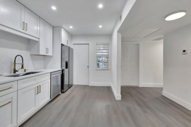 This property is sponsored by Listingcredit and qualifies for a on Palm-Aire Country Club and Resort - Palms in Florida - for sale on GolfHomes.com, golf home, golf lot