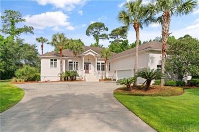 Nestled on a picturesque half-acre lot on the desirable Oak on Oak Grove Island Golf and Country Club in Georgia - for sale on GolfHomes.com, golf home, golf lot