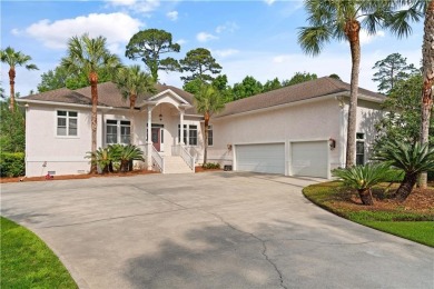 Nestled on a picturesque half-acre lot on the desirable Oak on Oak Grove Island Golf and Country Club in Georgia - for sale on GolfHomes.com, golf home, golf lot