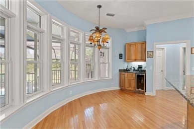 Nestled on a picturesque half-acre lot on the desirable Oak on Oak Grove Island Golf and Country Club in Georgia - for sale on GolfHomes.com, golf home, golf lot
