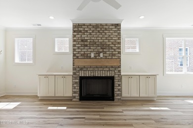 Experience refined coastal living at 387 Blossom Tree Lane SE on Carolina National Golf Club in North Carolina - for sale on GolfHomes.com, golf home, golf lot