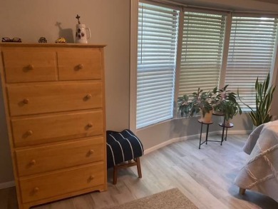 This meticulously maintained 2-bedroom, 2-bathroom home is being on Vista Plantation Golf Club in Florida - for sale on GolfHomes.com, golf home, golf lot