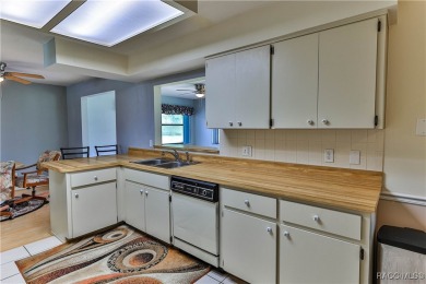 This 2-bedroom, 2-bathroom home features a 2-car garage on Brentwood Farms Golf Club in Florida - for sale on GolfHomes.com, golf home, golf lot