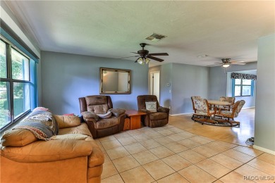 This 2-bedroom, 2-bathroom home features a 2-car garage on Brentwood Farms Golf Club in Florida - for sale on GolfHomes.com, golf home, golf lot