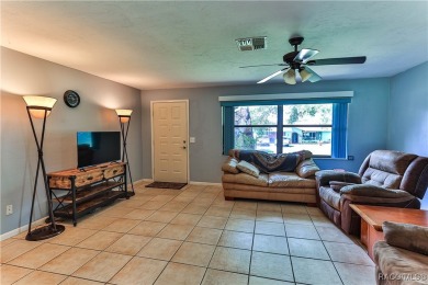 This 2-bedroom, 2-bathroom home features a 2-car garage on Brentwood Farms Golf Club in Florida - for sale on GolfHomes.com, golf home, golf lot