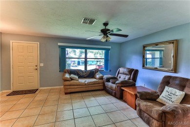 This 2-bedroom, 2-bathroom home features a 2-car garage on Brentwood Farms Golf Club in Florida - for sale on GolfHomes.com, golf home, golf lot