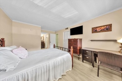 Enjoy serene northerly golf course views from your private oasis on Palm-Aire Country Club and Resort - Palms in Florida - for sale on GolfHomes.com, golf home, golf lot