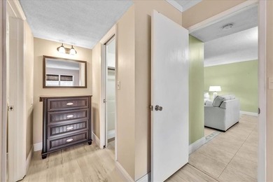 Enjoy serene northerly golf course views from your private oasis on Palm-Aire Country Club and Resort - Palms in Florida - for sale on GolfHomes.com, golf home, golf lot