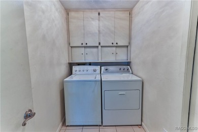 This 2-bedroom, 2-bathroom home features a 2-car garage on Brentwood Farms Golf Club in Florida - for sale on GolfHomes.com, golf home, golf lot