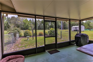 This 2-bedroom, 2-bathroom home features a 2-car garage on Brentwood Farms Golf Club in Florida - for sale on GolfHomes.com, golf home, golf lot