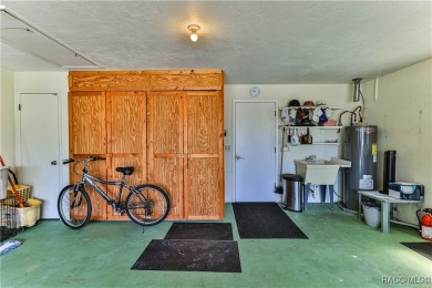 This 2-bedroom, 2-bathroom home features a 2-car garage on Brentwood Farms Golf Club in Florida - for sale on GolfHomes.com, golf home, golf lot
