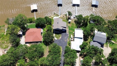 AMAZING TURNKEY LAKEHOUSE! Perfect for full time residence on Twisted Oaks Golf Club in Texas - for sale on GolfHomes.com, golf home, golf lot