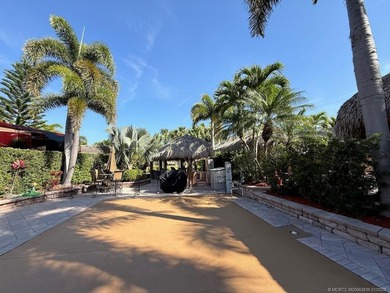 Discover the ultimate blend of luxury and convenience with this on St. Lucie Trail Golf Club in Florida - for sale on GolfHomes.com, golf home, golf lot