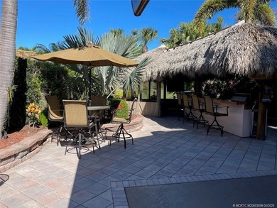 Discover the ultimate blend of luxury and convenience with this on St. Lucie Trail Golf Club in Florida - for sale on GolfHomes.com, golf home, golf lot