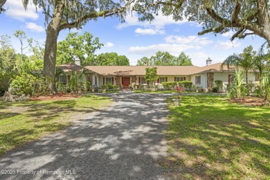 Located in the highly desirable Dogwood Estates golf course on Brooksville Country Club At Majestic Oaks in Florida - for sale on GolfHomes.com, golf home, golf lot