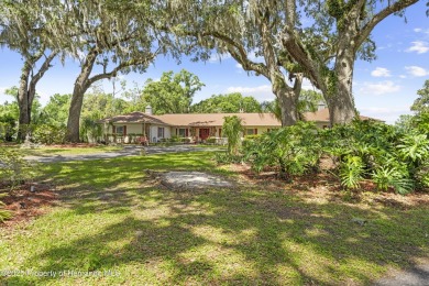 Located in the highly desirable Dogwood Estates golf course on Brooksville Country Club At Majestic Oaks in Florida - for sale on GolfHomes.com, golf home, golf lot